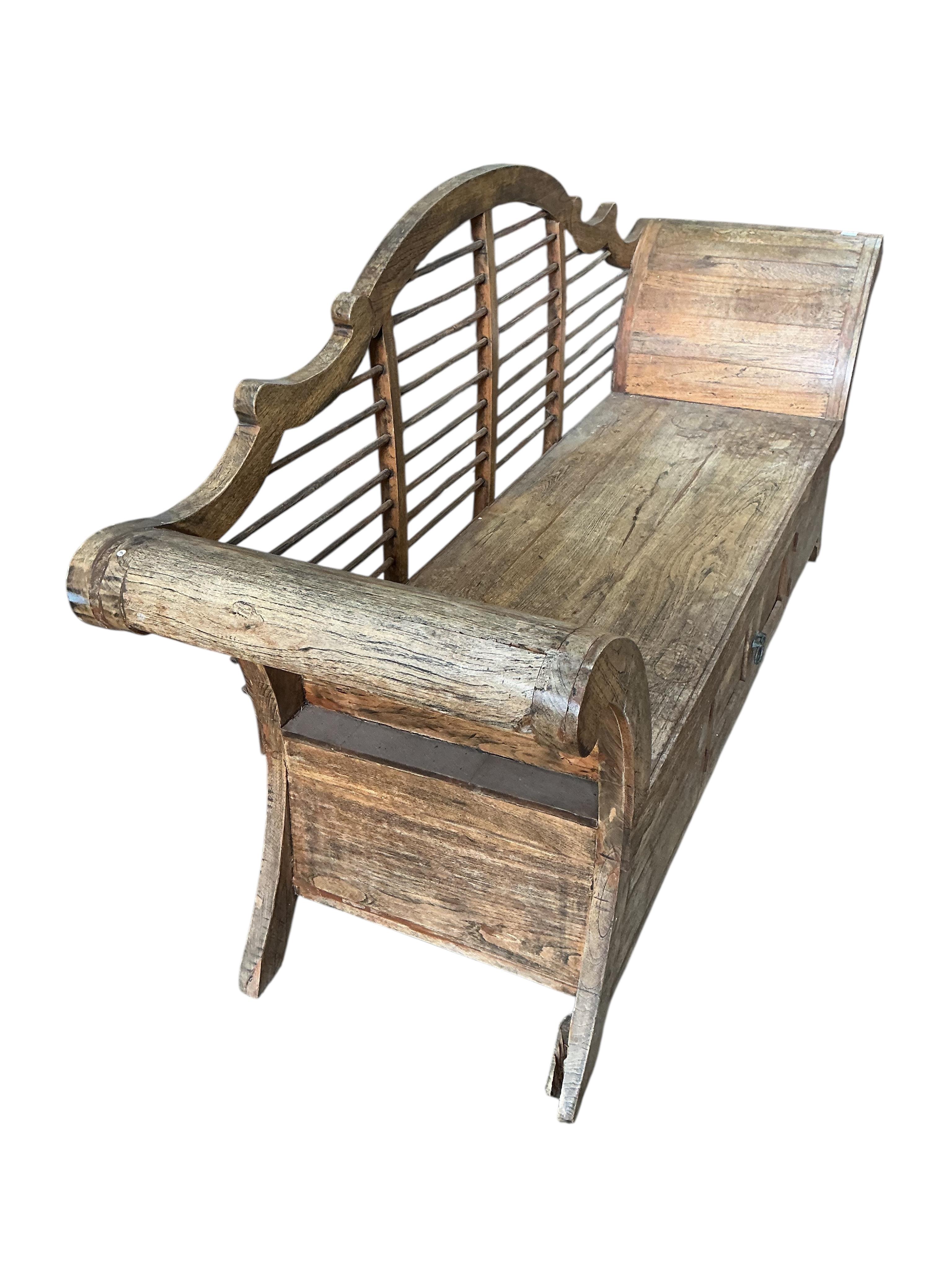 A Burmese hardwood settee, width 189cm, depth 54cm, height 93cm